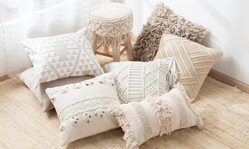 An,Assortment,Of,Cushions,Arranged,On,The,Floor,Of,A